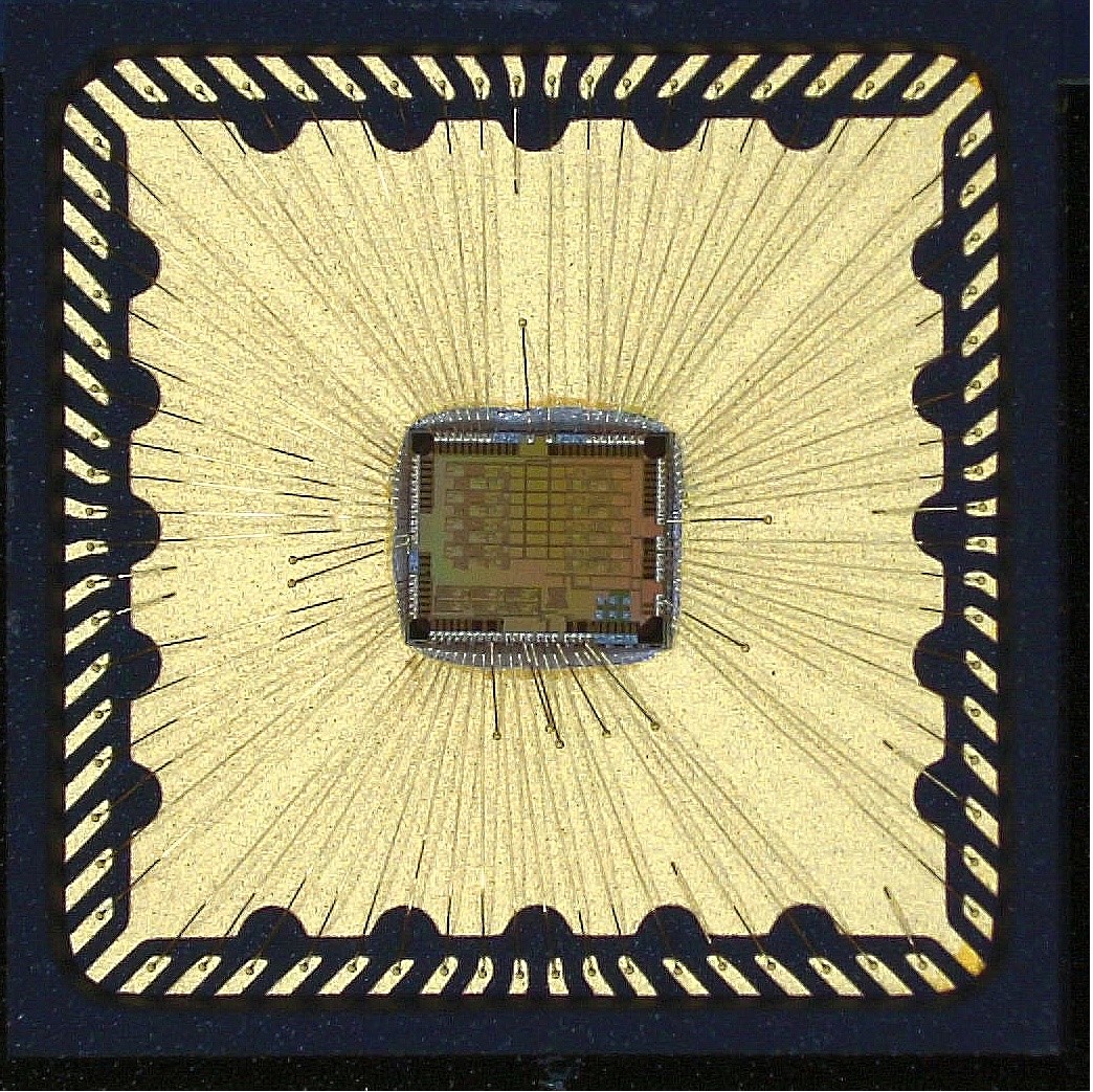 Micrograph of wirebonded EPhys and EChem amplifier array IC tapedout in TSMC 180nm node
